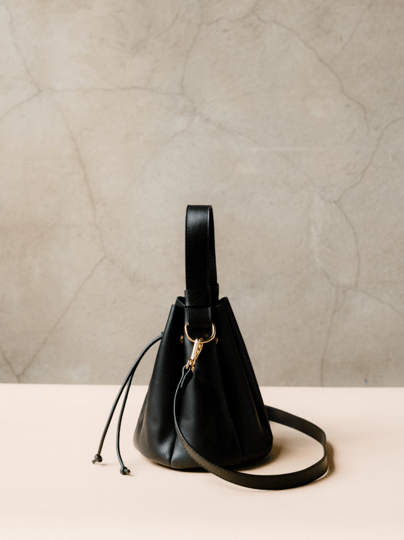 black leather bucket crossbody bag