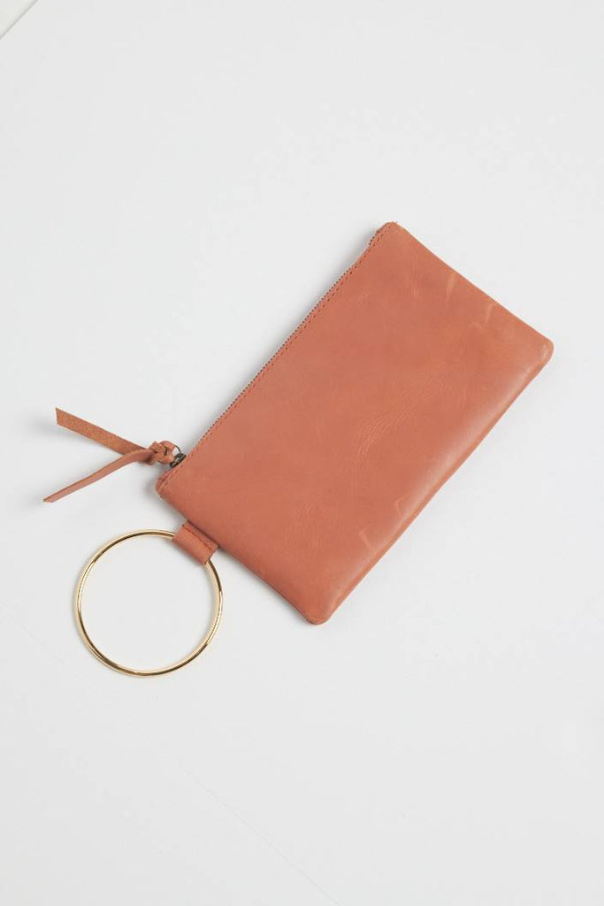 Clay colored leather wristlet