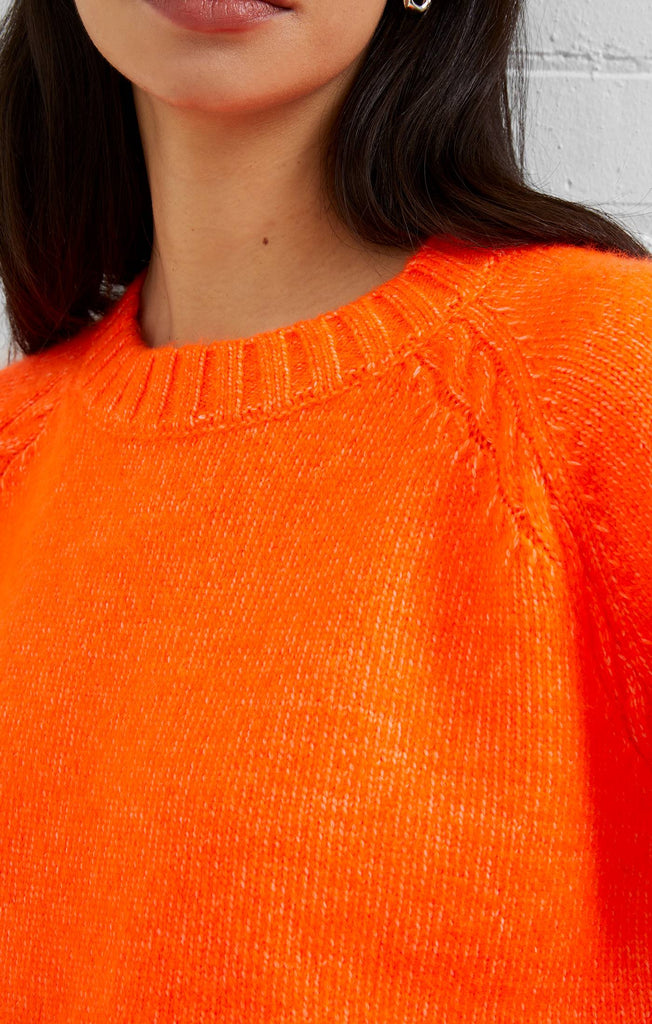 orange crew neck sweater