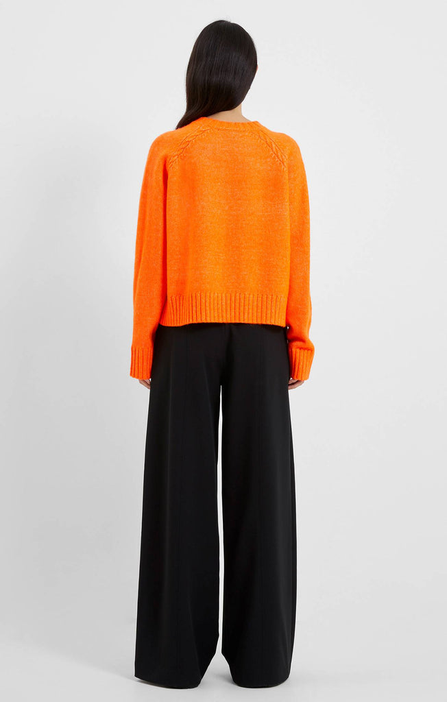 orange crewneck sweater