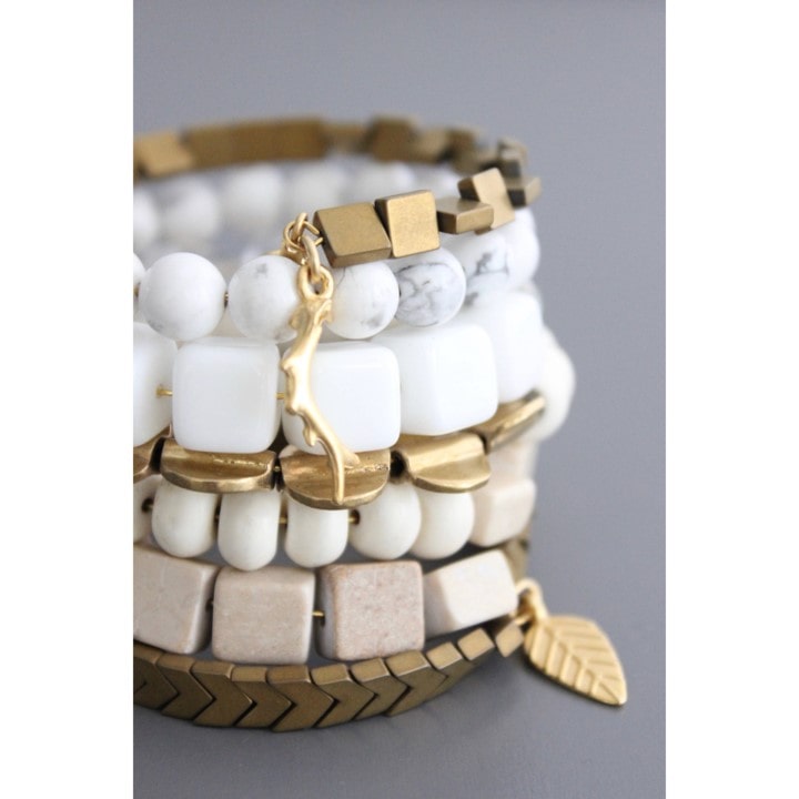 White and gold wrap bracelet.